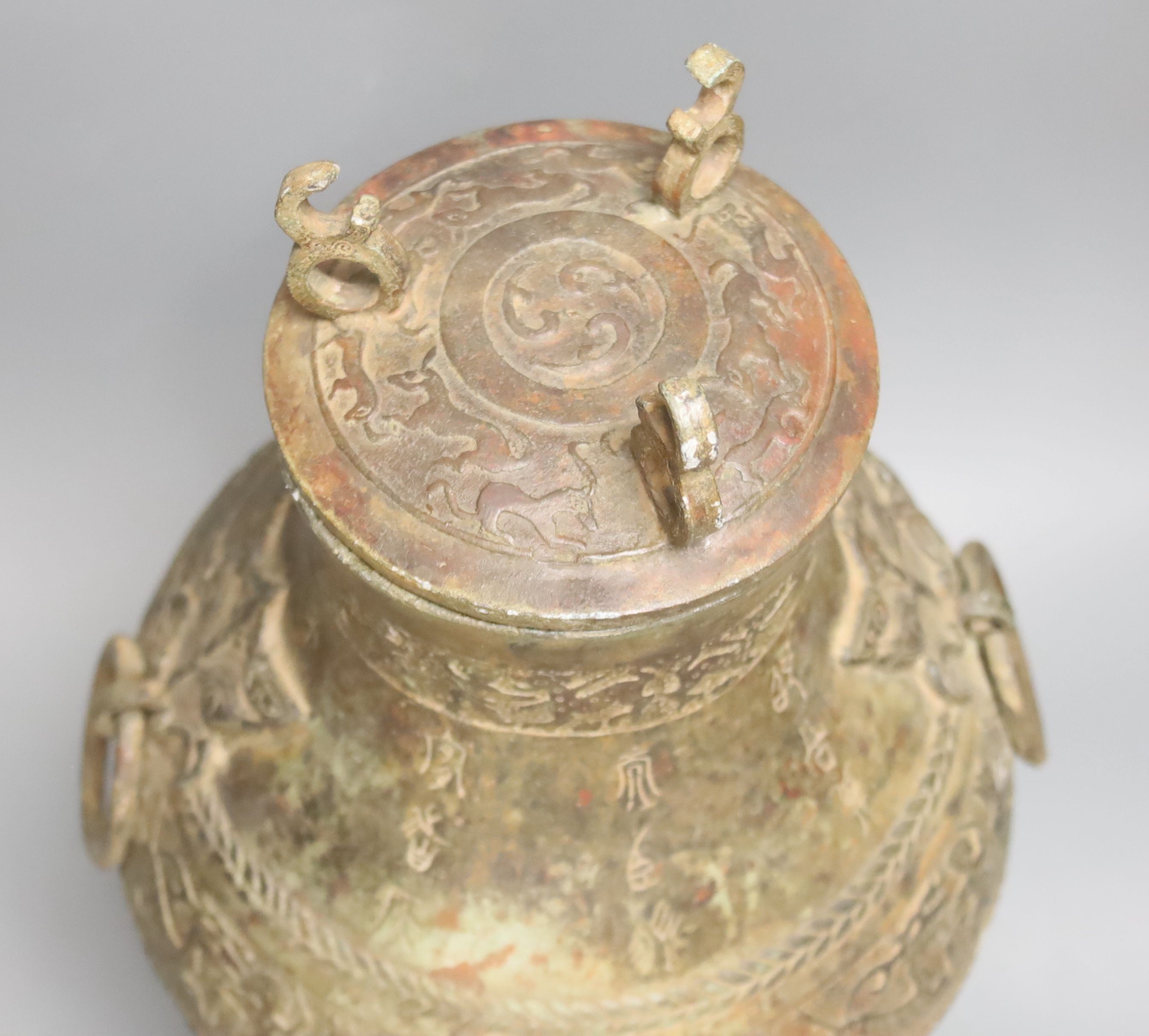A Chinese cast bronze jar and cover, height 40cm
